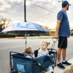 Parapluie poussette universel réglable anti-UV, idéal pour landau, offrant une protection solaire lors des balades en famille.