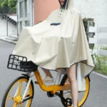 Poncho femme large beige imperméable, style coréen, avec pochette pour enfants et femmes, pratique et chic pour cyclistes.