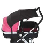 Poussette noire avec capote anti-UV et coussin rose, offrant une protection optimale contre le soleil et la pluie pour bébé.