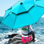 Parapluie octogonal bleu pour la pêche, avec siège de camping et glacière, idéal pour le bord de mer et l'extérieur.