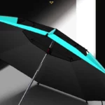 Parapluie de pêche octogonal noir et turquoise, élégant et moderne, idéal pour une protection optimale contre la pluie.