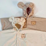 Ponchos enfants imperméables avec designs d'ours et de lapin, adorables et pratiques pour protéger vos petits les jours de pluie.
