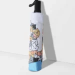 Parapluie pliable blanc avec motif chats mignons, base bleue, anti-UV. Accessoire stylé et pratique pour la pluie et le soleil.