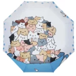 Parapluie manuel chat blanc et bleu anti UV, motifs chats mignons dans une tasse bleue, parfait contre pluie et soleil.