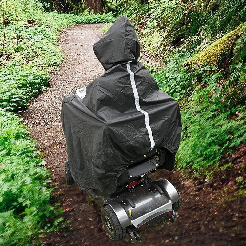 Poncho de pluie noir pour fauteuil roulant motorisé, protection intégrale en extérieur, parfait pour les balades en forêt.
