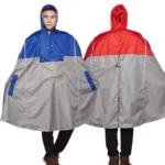 Poncho vélo gris bicolore avec visière, imperméable et pratique pour la pluie, taille unique, idéal pour cyclistes en déplacement.