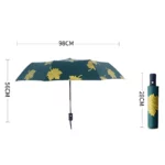 Parapluie pliant vert motifs feuilles dorées, ouvert, 98 cm diamètre, 56 cm hauteur, housse 28 cm, chic et pratique contre la pluie.