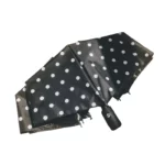 Parapluie automatique noir, motif à pois, solide.