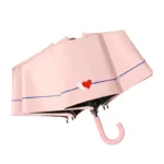 Parapluie rose à double cœur élégant, bordure bleue, design tendance, parfait pour égayer vos journées pluvieuses.