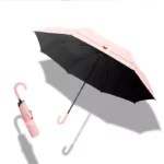 Joli parapluie rose manuel avec motif doube-coeur.