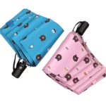 Magnifiques parapluies automatiques rose et bleu ciel à motif de tête d'ourson.