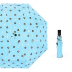 Magnifique parapluie automatique bleu ciel avec un motif de tête d'ourson.