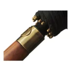 Bouton de d'ouverture d'un parapluie de golf.