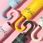 Joli parapluie canne, thème : notes de musiques, solide et magnifique, rose, bleu, jaune, vert, blanc.