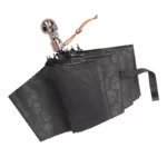 Magnifique parapluie noir automatique à tête de mort, c'est très original.