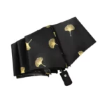 Joli parapluie noir automatique de qualité.