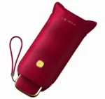 Étui bordeaux élégant avec finitions dorées, protection haut de gamme.