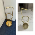 Très joli porte-parapluie en métal circulaire doré !