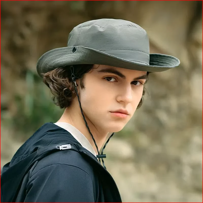 Bob imperméable homme en nylon, style aventurier. Protection solaire et coupe-vent parfaite pour la randonnée, la pêche ou le camping.