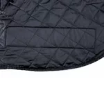 Doublure matelassée intérieure du tablier scooter. Confort thermique renforcé et résistance accrue aux intempéries.