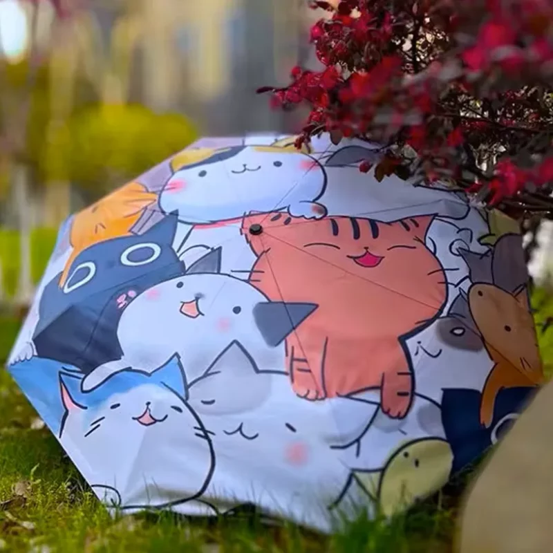 Parapluie auto matique décoré de chats mignons. Tissu imperméable, design coloré et joyeux. Parfait pour égayer les journées pluvieuses. Idéal en cadeau.