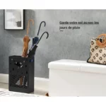 Porte-parapluie rectangulaire noir en métal, motif parapluie et gouttes, parfait pour une entrée élégante et bien organisée.
