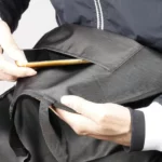 Poche de rangement pratique du tablier scooter coupe-vent, idéale pour smartphone et accessoires lors de vos trajets quotidiens.