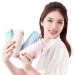 Parapluie pastel en plusieurs couleurs (rose, bleu, beige, vert). Mini modèle ultra léger, idéal pour sac. Style moderne et couleurs douces.