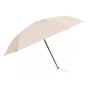 Parapluie beige élégant et minimaliste, adapté à tous les styles. Compact, robuste et raffiné, il offre une protection idéale contre la pluie quotidienne.