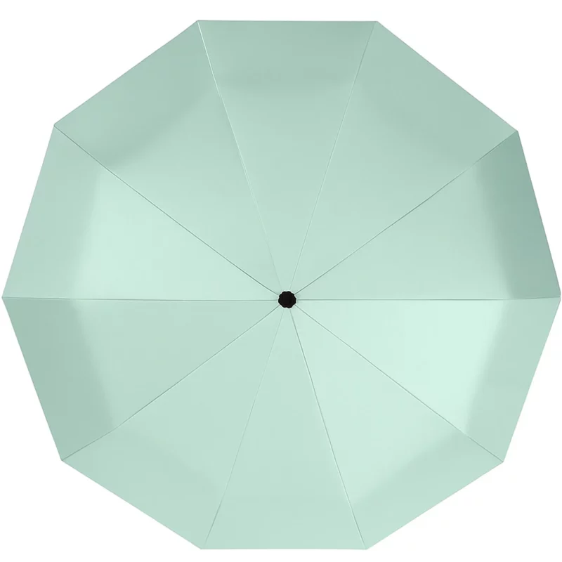 Vue de dessus d’un parapluie vert d'eau. Son large diamètre assure une couverture optimale tout en gardant un look tendance et minimaliste.