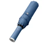 Parapluie bleu automatique LED. Teinte élégante, ouverture rapide, structure renforcée contre les vents. Compact et fiable.