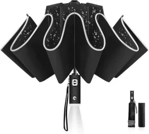 Parapluie noir robuste, ouvert, avec gouttes d’eau visibles. Poignée LED pratique, design pliable. Protection efficace sous la pluie.