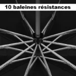 Zoom sur 10 baleines résistantes en métal. Parapluie noir ultra solide, supporte les vents forts, durabilité garantie.