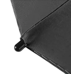 Embout renforcé (aiguillettes) d'un parapluie noir automatique de luxe, finition premium anti-retournement.