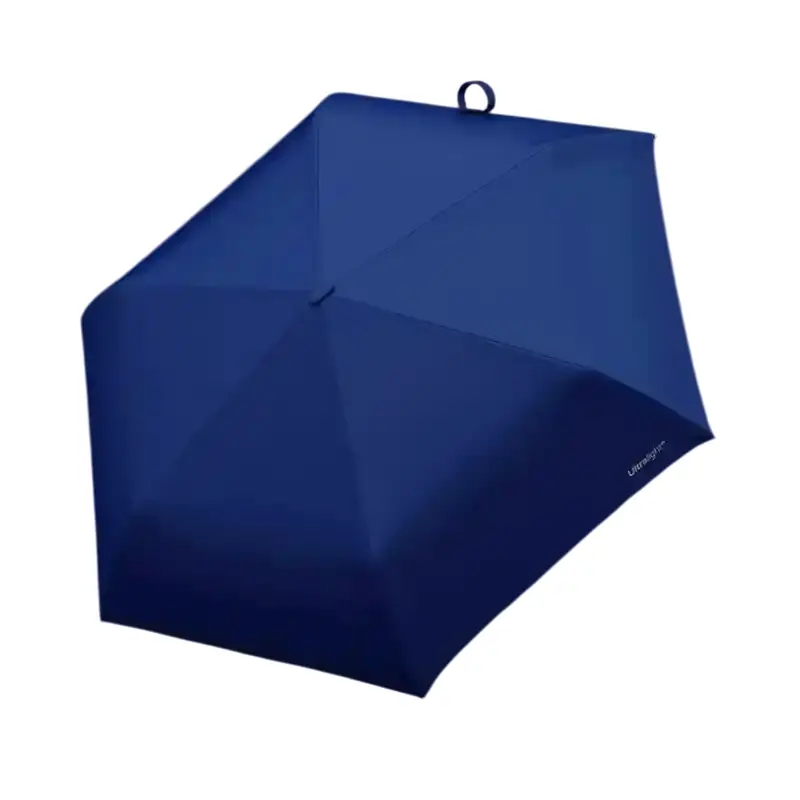 Parapluie bleu marine de luxe ouvert sur fond gris, design minimaliste et moderne, parfait pour une touche d'élégance sous la pluie.