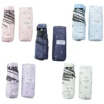 Collection complète : bleu marine, bleu clair, rose et blanc. Parapluies compacts à motifs, parfaits pour un usage quotidien.