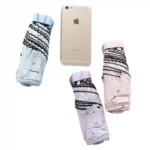 Mini parapluies pour enfants en bleu, violet, rose et blanc. Modèles légers à motifs, parfaits pour sacs ou pochettes.