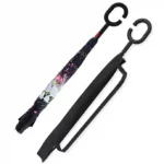 Parapluie inversé design avec poignée en C noire. Motifs fleurs et papillons raffinés. Ouverture inversée, confort et style par temps de pluie.